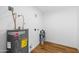 Clean utility room with new floors and plenty of space for storage and appliances at 7160 W Virginia Ave, Phoenix, AZ 85035