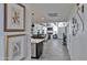 Hallway view of the home's interior leading to an open-concept living space at 7955 E Chaparral Rd # 57, Scottsdale, AZ 85250