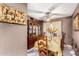 Traditional dining room featuring wooden furniture and a decorative cabinet at 9014 E Sharon Dr, Scottsdale, AZ 85260