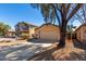Charming single-story home featuring a well-maintained exterior, tile roof and a two-car garage at 911 E Lovegrass Dr, San Tan Valley, AZ 85143