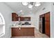 Modern kitchen featuring granite counters, stainless steel appliances, and ample cabinet space at 911 E Lovegrass Dr, San Tan Valley, AZ 85143