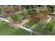 Aerial view of community amenities including corn hole, bocce ball, tennis court, and green space at 10027 W Verde Ln, Avondale, AZ 85392