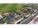 Aerial view of community amenities including basketball court, green spaces, parking, and landscaping at 10027 W Verde Ln, Avondale, AZ 85392