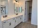 Bathroom featuring a double sink vanity with sleek fixtures at 10027 W Verde Ln, Avondale, AZ 85392