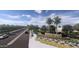 Beautiful entrance to Acclaim community with mature landscaping at 10027 W Verde Ln, Avondale, AZ 85392