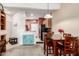An open-concept dining area next to kitchen with dark wooden table and seating at 1015 S Val Vista Dr # 81, Mesa, AZ 85204