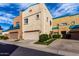 Two story condo with attached garage and a well-manicured front lawn at 1015 S Val Vista Dr # 81, Mesa, AZ 85204
