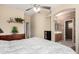Serene main bedroom with calming colors and decor, leading to an ensuite bathroom at 1015 S Val Vista Dr # 81, Mesa, AZ 85204
