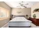 Spacious main bedroom with a ceiling fan, neutral tones, and a large bed at 1015 S Val Vista Dr # 81, Mesa, AZ 85204