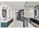 Luxurious bathroom featuring double sinks, a glass shower, and modern finishes at 1040 E Osborn Rd # 404, Phoenix, AZ 85014