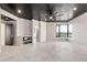 Bright bedroom showcasing tile flooring, recessed lighting, and a cityscape view at 1040 E Osborn Rd # 404, Phoenix, AZ 85014