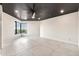 Contemporary bedroom with large window and modern ceiling fan at 1040 E Osborn Rd # 404, Phoenix, AZ 85014