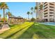 Lush, manicured lawn with covered outdoor seating areas, perfect for relaxation or entertaining at 1040 E Osborn Rd # 404, Phoenix, AZ 85014