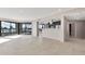 Open-concept living space with tile flooring and access to a balcony with city views at 1040 E Osborn Rd # 404, Phoenix, AZ 85014