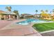 Community pool area with covered seating and lounge chairs at 1040 E Osborn Rd # 404, Phoenix, AZ 85014