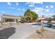 Expansive backyard with a pool is designed for outdoor entertaining and leisure at 10541 E Windrose Dr, Scottsdale, AZ 85259