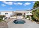 Backyard features a pool and a jacuzzi, offering a serene escape for ultimate relaxation and wellness at 10541 E Windrose Dr, Scottsdale, AZ 85259