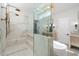 Contemporary bathroom with a large shower, freestanding tub, and modern fixtures at 10541 E Windrose Dr, Scottsdale, AZ 85259