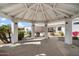 View from the cabana showing the seamless connection between indoor and outdoor spaces and beautiful landscaping at 10541 E Windrose Dr, Scottsdale, AZ 85259