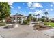 View of the expansive grounds with lush landscaping and a cabana creating a serene outdoor oasis at 10541 E Windrose Dr, Scottsdale, AZ 85259