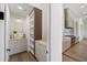 Walk-in pantry with storage shelves and custom cabinetry at 10541 E Windrose Dr, Scottsdale, AZ 85259