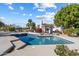 Beautiful pool, lush landscaping and cabana make for a stunning backyard retreat at 10541 E Windrose Dr, Scottsdale, AZ 85259