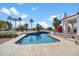 A refreshing pool surrounded by meticulously landscaped grounds for relaxation and enjoyment at 10541 E Windrose Dr, Scottsdale, AZ 85259