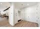 Bright mudroom with custom built-in storage solutions and modern design elements at 11212 N Miller Rd, Scottsdale, AZ 85260