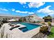 Inviting backyard pool with lounge chairs and landscaped surroundings at 11212 N Miller Rd, Scottsdale, AZ 85260