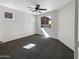 Bright and airy bedroom with plush carpeting and plenty of natural light at 1131 E Catino St, San Tan Valley, AZ 85140