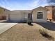 Charming single-story home with a two-car garage and low-maintenance landscaping at 1131 E Catino St, San Tan Valley, AZ 85140
