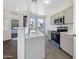 Well-equipped kitchen with modern appliances and a stylish sink with sleek countertops at 1131 E Catino St, San Tan Valley, AZ 85140