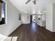 Open-concept living room with sleek flooring, recessed lighting, and a welcoming entry at 1131 E Catino St, San Tan Valley, AZ 85140