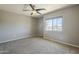 Carpeted bedroom with natural light and a view of the mountain landscape at 1236 E Mescal St, Phoenix, AZ 85020