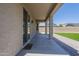 Spacious covered patio for outdoor living with brick accents and easy access to the yard at 1236 E Mescal St, Phoenix, AZ 85020