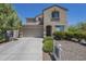 Charming two-story home with a well-maintained front yard and inviting curb appeal at 1236 E Mescal St, Phoenix, AZ 85020