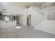 Open living space with high ceilings, tile floors, and a kitchen view, perfect for entertaining at 1236 E Mescal St, Phoenix, AZ 85020