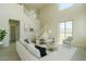 Cozy living room with plush seating, neutral decor, and a serene view of the outdoors at 1236 E Mescal St, Phoenix, AZ 85020