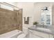 Bathroom featuring shower over tub with tiled walls, white granite vanity, and modern fixtures at 14715 N Adero Canyon Dr, Fountain Hills, AZ 85268