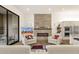 The cozy living room features a fireplace with built-in shelves at 14715 N Adero Canyon Dr, Fountain Hills, AZ 85268