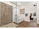 Elegant bathroom featuring a glass-enclosed shower, a modern standalone bathtub, and ample natural light at 14715 N Adero Canyon Dr, Fountain Hills, AZ 85268
