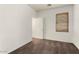Neutral bedroom with a large window and horizontal blinds, offering ample natural light and privacy at 14994 W Charter Oak Rd, Surprise, AZ 85379