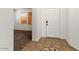 Welcoming entryway with stylish tile flooring and natural light at 14994 W Charter Oak Rd, Surprise, AZ 85379