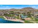 Picturesque community park featuring a sandy beach, ramadas, tennis courts, and grassy areas, ideal for outdoor activities at 15720 S 182Nd Ave, Goodyear, AZ 85338