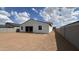 Large backyard is enclosed by block wall fence at 15782 W Cheryl Dr, Waddell, AZ 85355