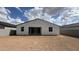 Backyard with privacy fence and minimal landscaping at 15782 W Cheryl Dr, Waddell, AZ 85355