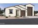 Beautiful single story home with a two car garage and desert landscaping at 15782 W Cheryl Dr, Waddell, AZ 85355