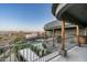 Balcony view overlooking a swimming pool and mountain landscape beyond desert foliage at 15830 E Eagle Crest Rd, Fountain Hills, AZ 85268