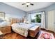 Comfortable bedroom featuring a bed, dresser, and a beautiful window view at 15830 E Eagle Crest Rd, Fountain Hills, AZ 85268