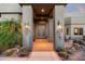 Inviting home entrance with double doors and potted succulent plants at 15830 E Eagle Crest Rd, Fountain Hills, AZ 85268